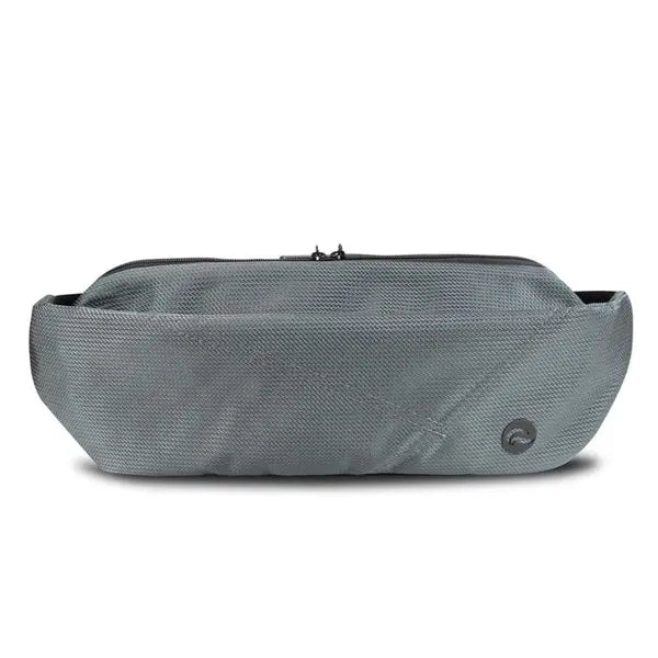 The Skunk Drifter Medium Crossbody Bag in Metal Gray features 100% smell and weather proof carbon lining, a textured surface, zip closure, and a small circular logo in the corner. Shown against a white background.